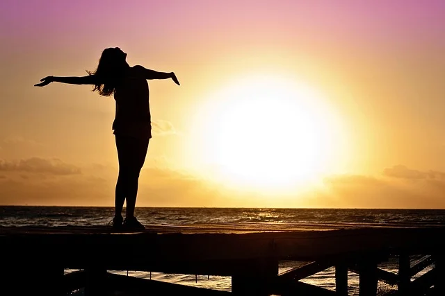 happy woman in sunset